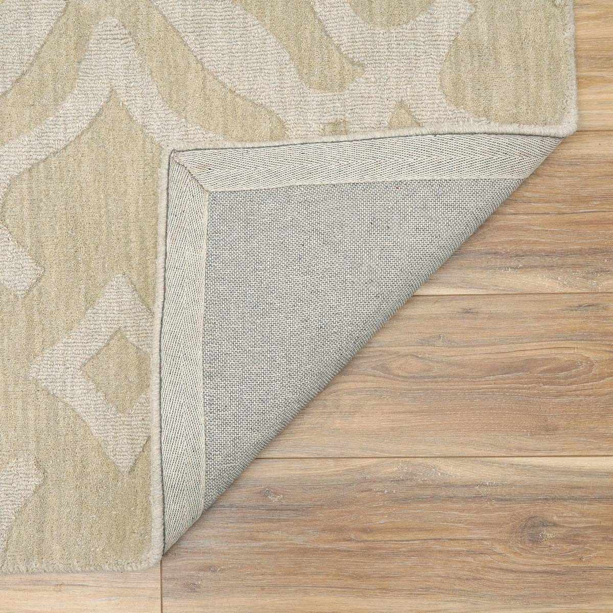 Fyffe Embossed Beige Wool Area Rug