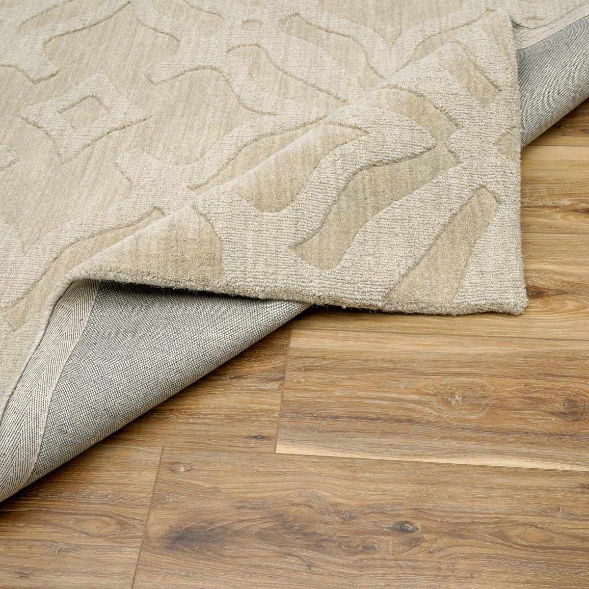 Fyffe Embossed Beige Wool Area Rug